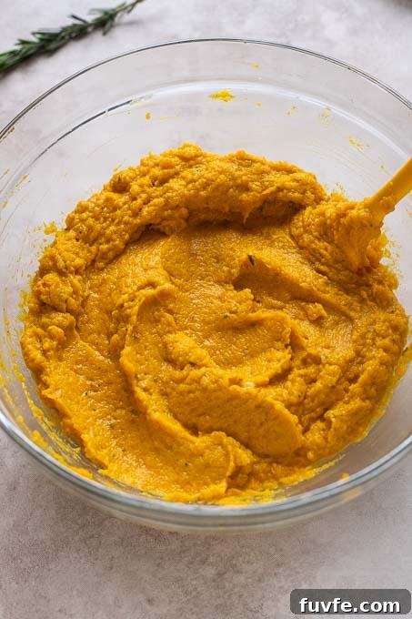 Velvety Kabocha Squash Mash Recipe 8 Creamy kabocha mash in a mixing bowl.