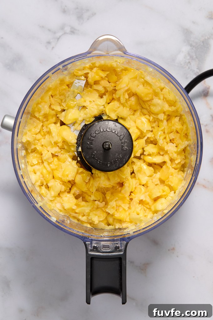 Fresh corn processed in food processor.