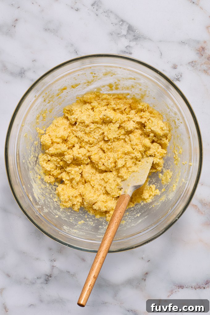 Corn cake batter with fresh corn before baking.