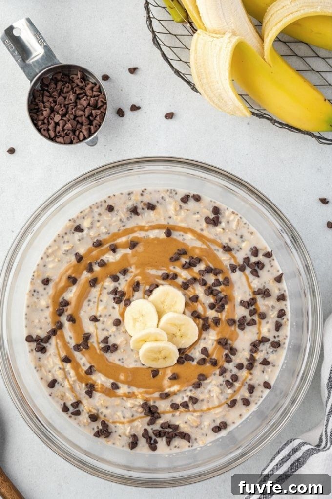 Peanut butter banana overnight oats in a mixing bowl