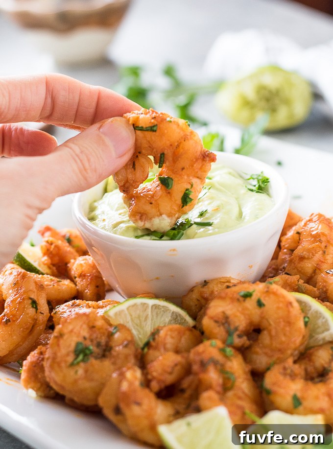 Blackened shrimp dunked in avocado ranch
