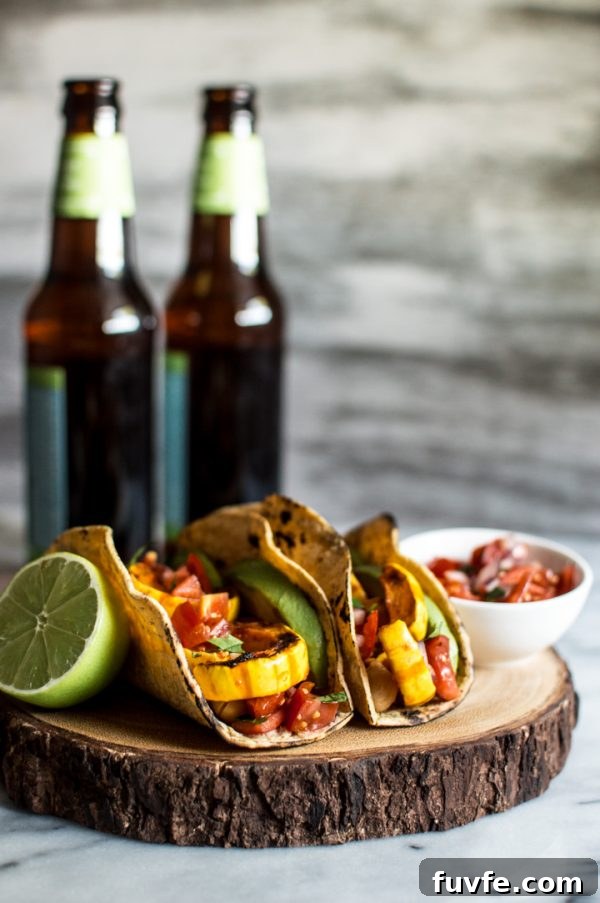 Delicata squash tacos with beer in background