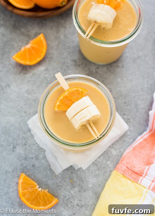 Creamy Orange Creamsicle Smoothie Recipe 3 Overhead shot of orange creamsicle smoothie in a jar