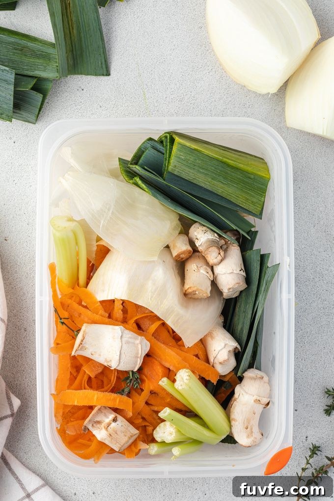 Vegetable scraps in a stasher for veggie broth