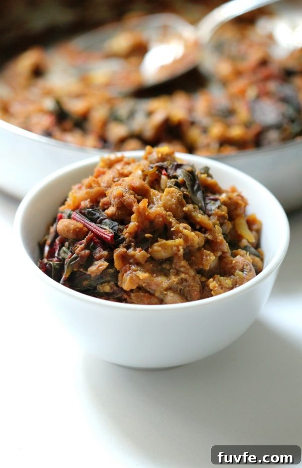 Black eyed pea curry in white bowl