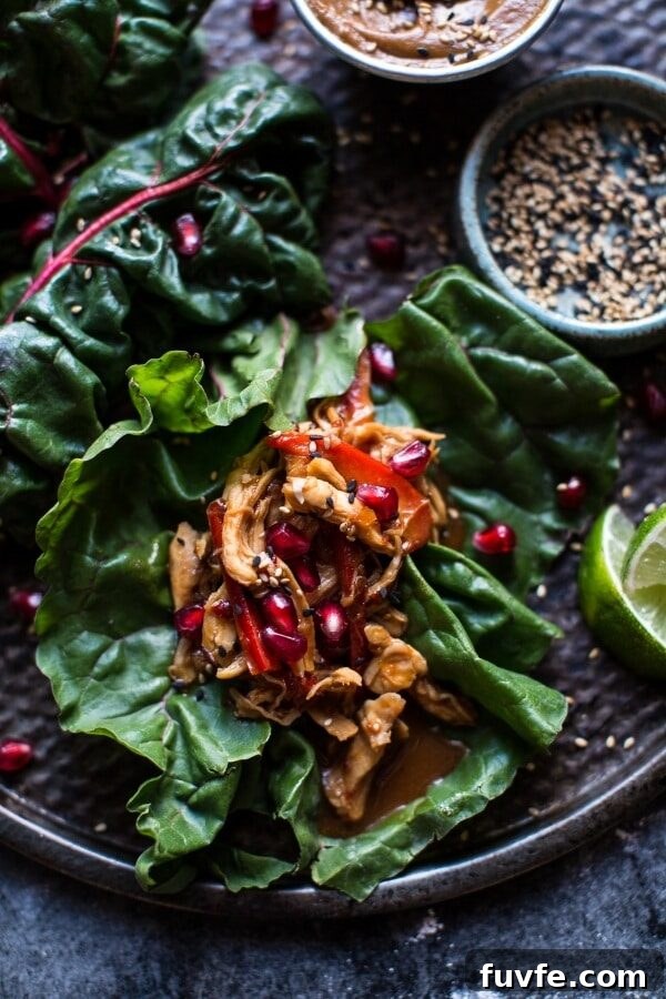 Swiss chard wraps with lime on a dark plate