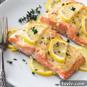 Baked dijon salmon on a plate.