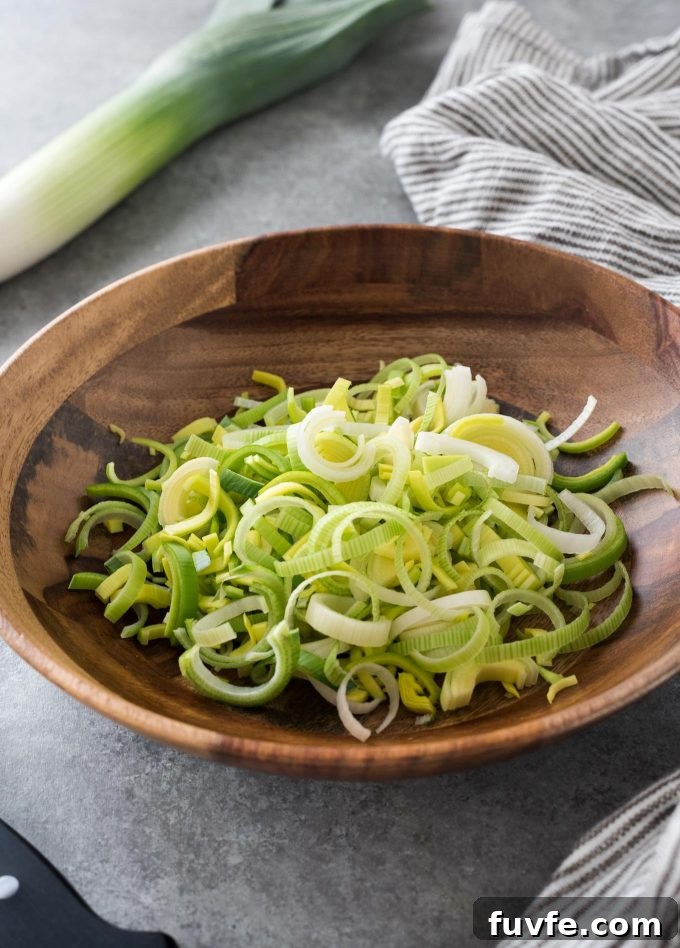 23 Leek Recipes With Buying, Storing and Cooking Tips 3 Chopped leeks in a teak bowl