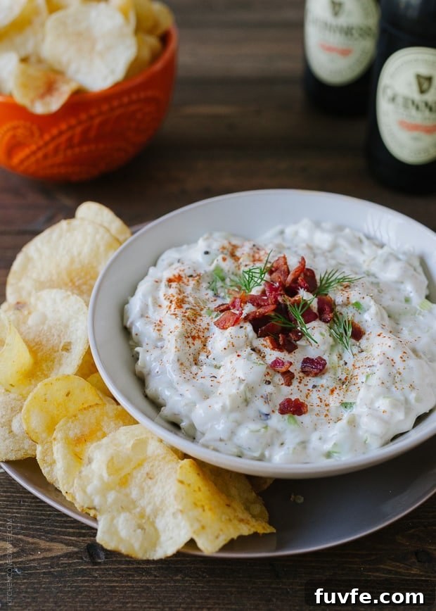 Bacon leek dip in a bowl with chips