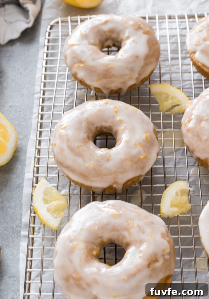 Baked Lemon Donuts Recipe with Zesty Glaze 5 Lemon Baked Donuts with lemon glaze.