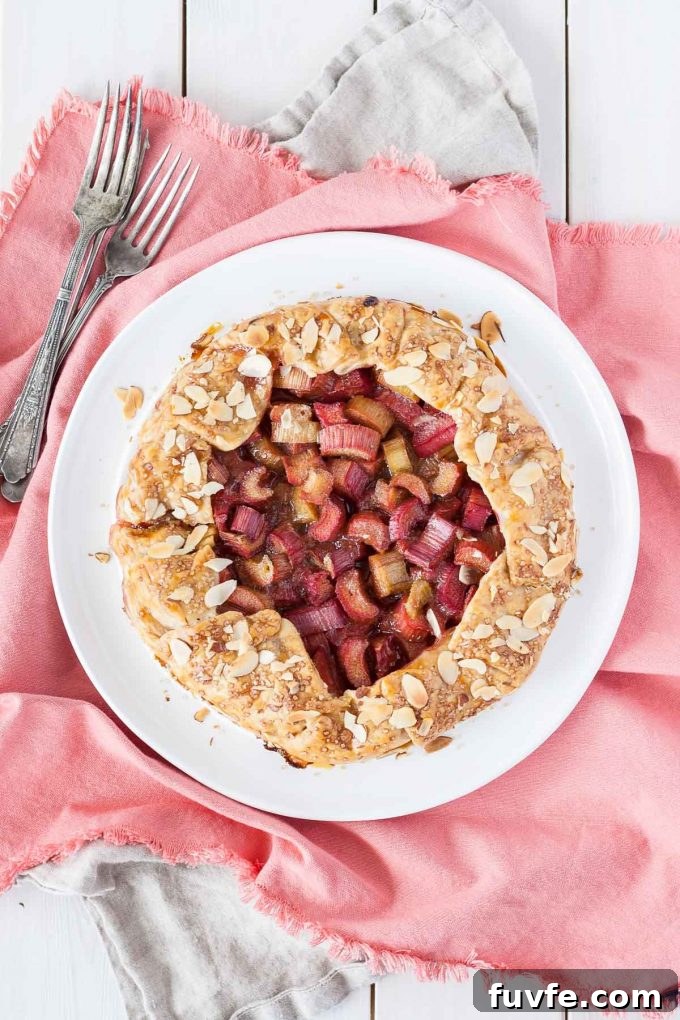 Rhubarb galette on a white round plate