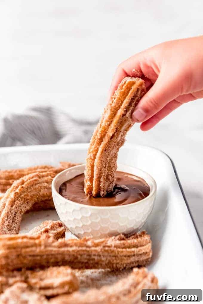 Iced Witches’ Brew Coffee: Spiced Cold Brew Recipe for Fall 13 homemade churros dipped into sauce