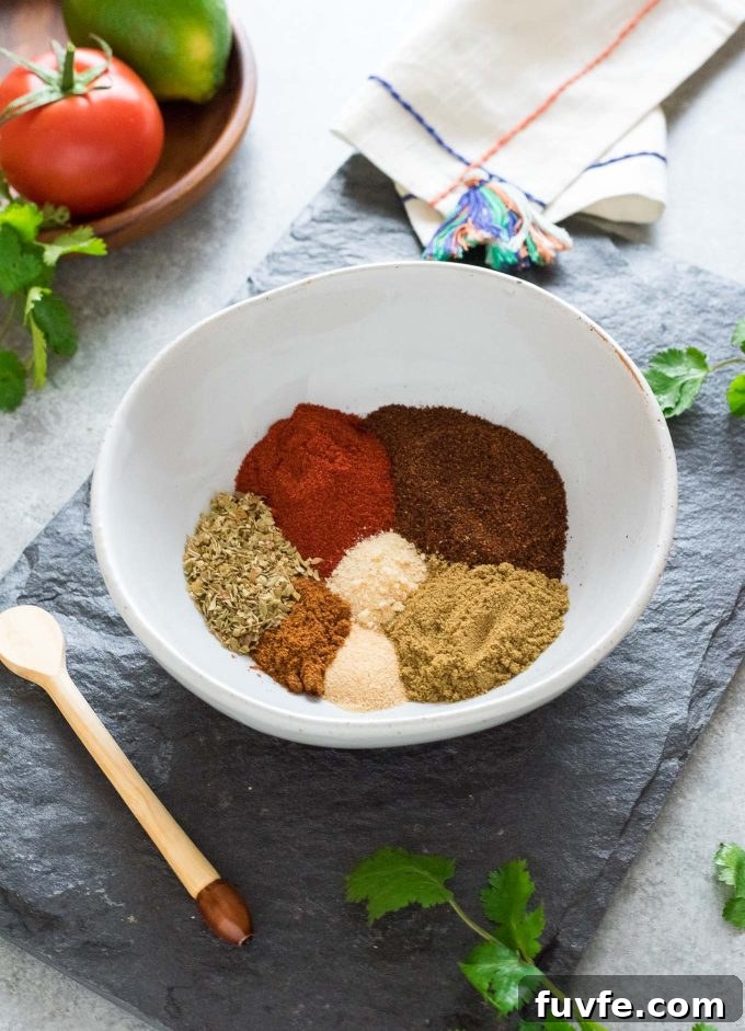 Homemade Taco Seasoning Mix Recipe for Authentic Flavor 2 Homemade taco seasoning ingredients in a bowl