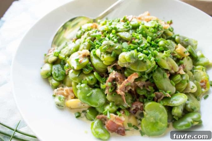 Fava beans with proscuitto piled on a plate