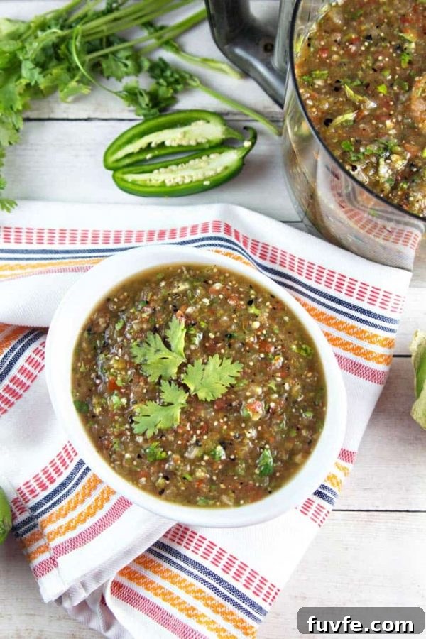 Roasted tomatillo salsa verde in a white bowl