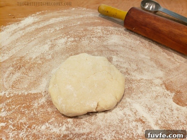 Pie dough is rolled out before cutting into circle shapes for handpies.