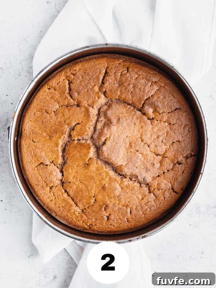 Norwegian Spice Cake Recipe: Classic Krydderkake with Warm Spices 6 Overhead view of a gold brown baked cake.