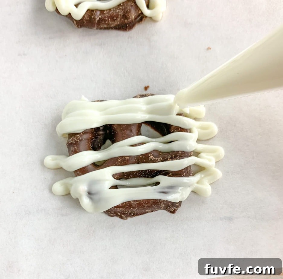 Spooky Halloween Chex Mix Recipe for Parties and Treats 6 How to make the chocolate covered pretzel mummies for your Halloween Snack Mix