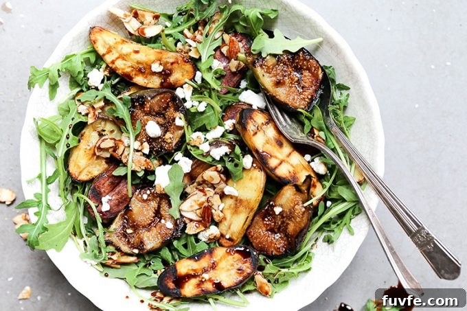 Grilled fig potato salad on a white plate