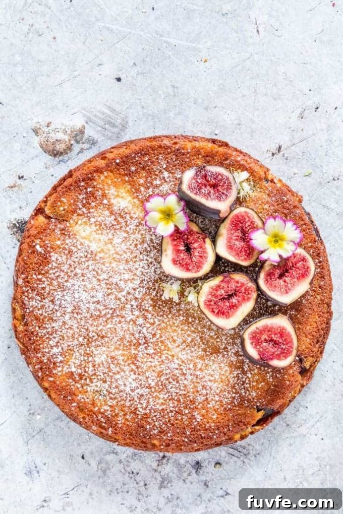Overhead view of a fig and goat cheese galette. One slice has been cut and is about to be removed.