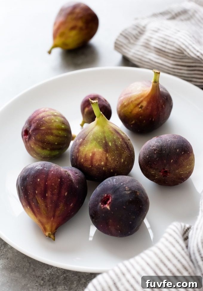 Fresh figs on a white plate