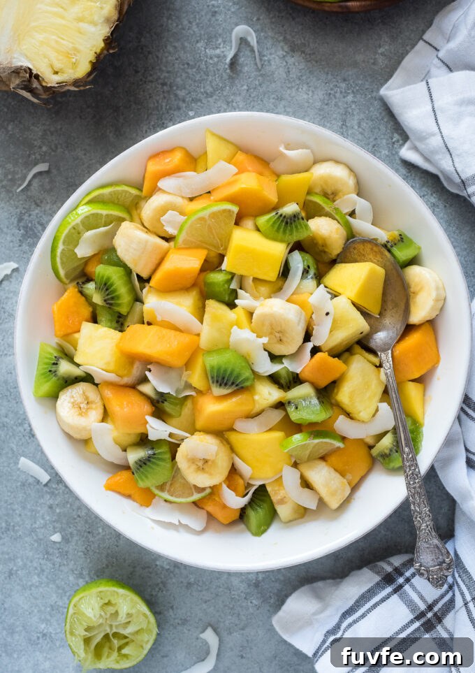 Refreshing Tropical Fruit Salad with Coconut and Lime 3 Tropical fruit salad with lime and coconut.