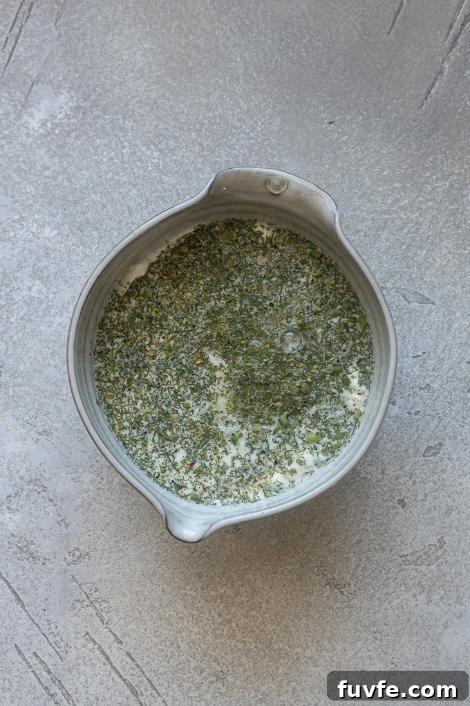 Creamy Homemade Greek Yogurt Ranch Dressing Recipe 4 Ingredients for ranch dressing using Greek yogurt in a bowl.