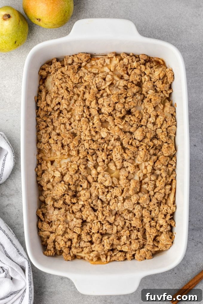Warm Pear Crumble Recipe with Cinnamon Oat Topping 8 Pear crumble in baking dish