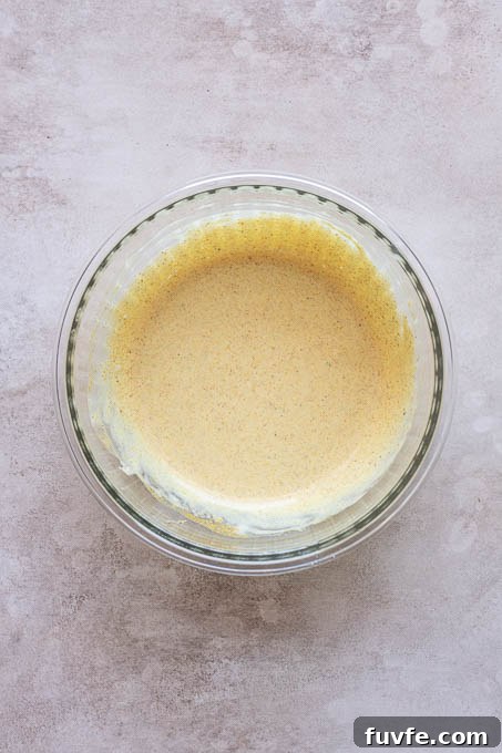 Creamy curry dressing in a bowl.