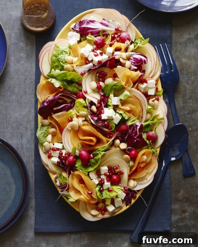 Overhead view of a fall harvest salad on a serving platter.