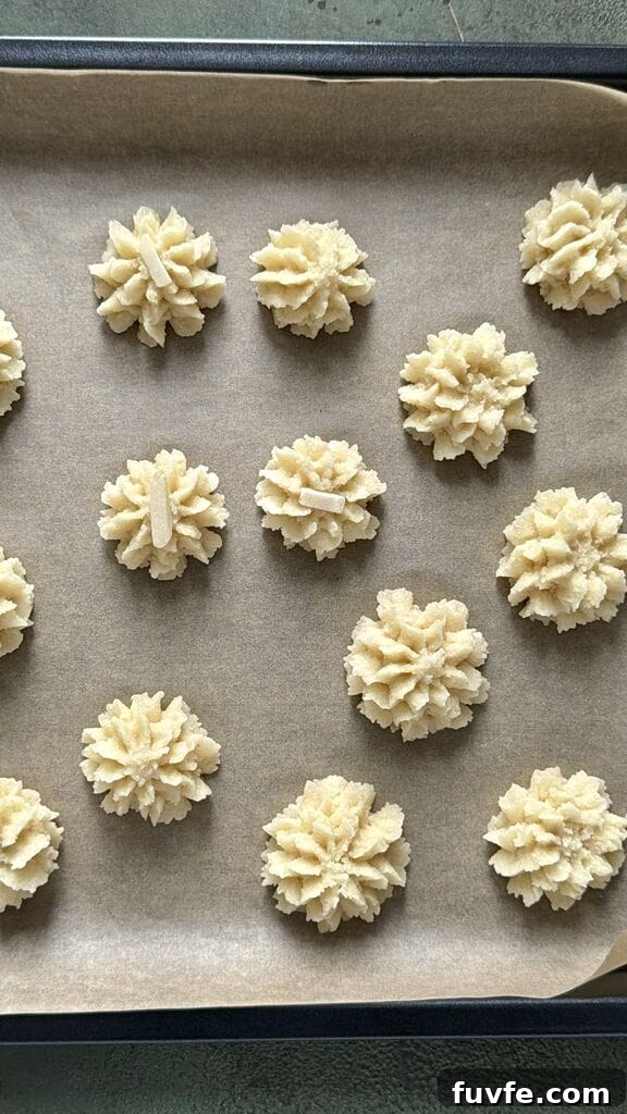 the piped cookies ready to bake