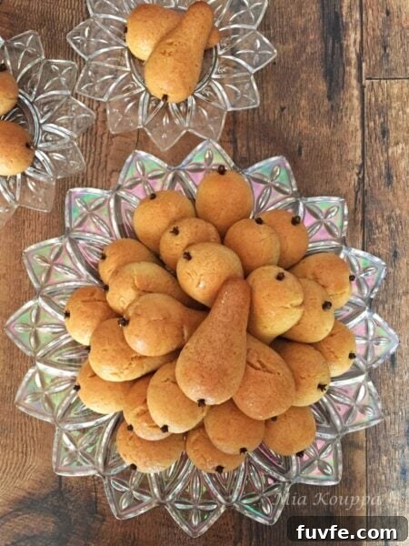 Syrup soaked cookies shaped like little pears but flavoured with a hint of orange!