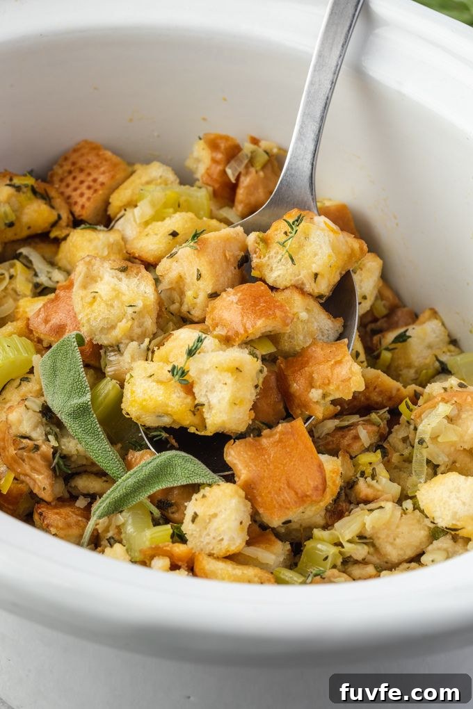 Spoonful of bread stuffing in the crock pot