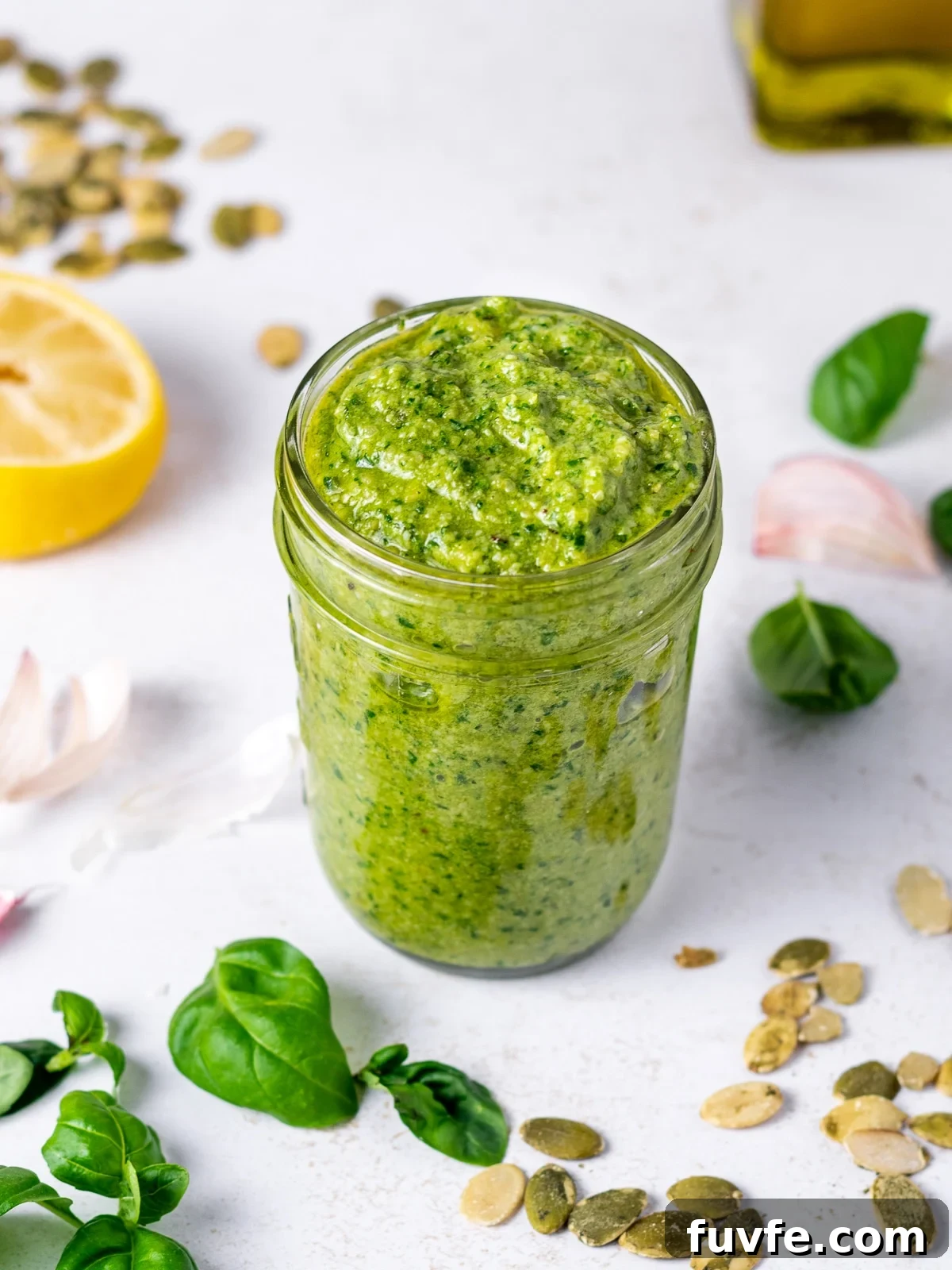 Pepita Pesto Recipe: Nutty Pumpkin Seed Sauce for Pasta & Toast 7 jar of bright green pesto made from fresh basil and pumpkin seeds