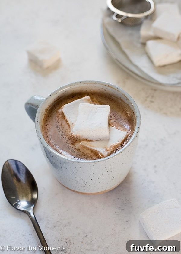 Microwave hot chocolate in a mug with marshmallows in a mug