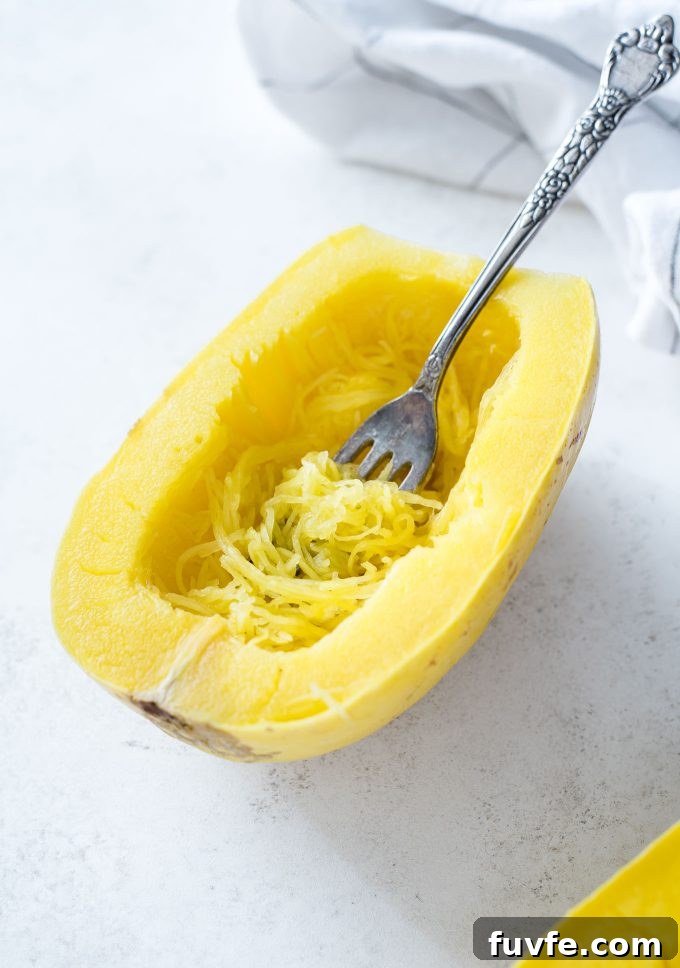 Fork shredding spaghetti squash