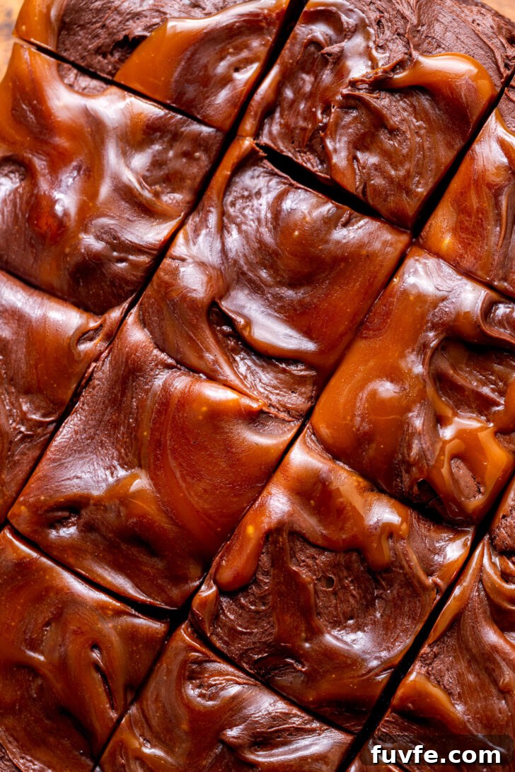 Decadent Chocolate Caramel Cake Recipe for Special Occasions 3 Caramel swirled on top of chocolate caramel cake.
