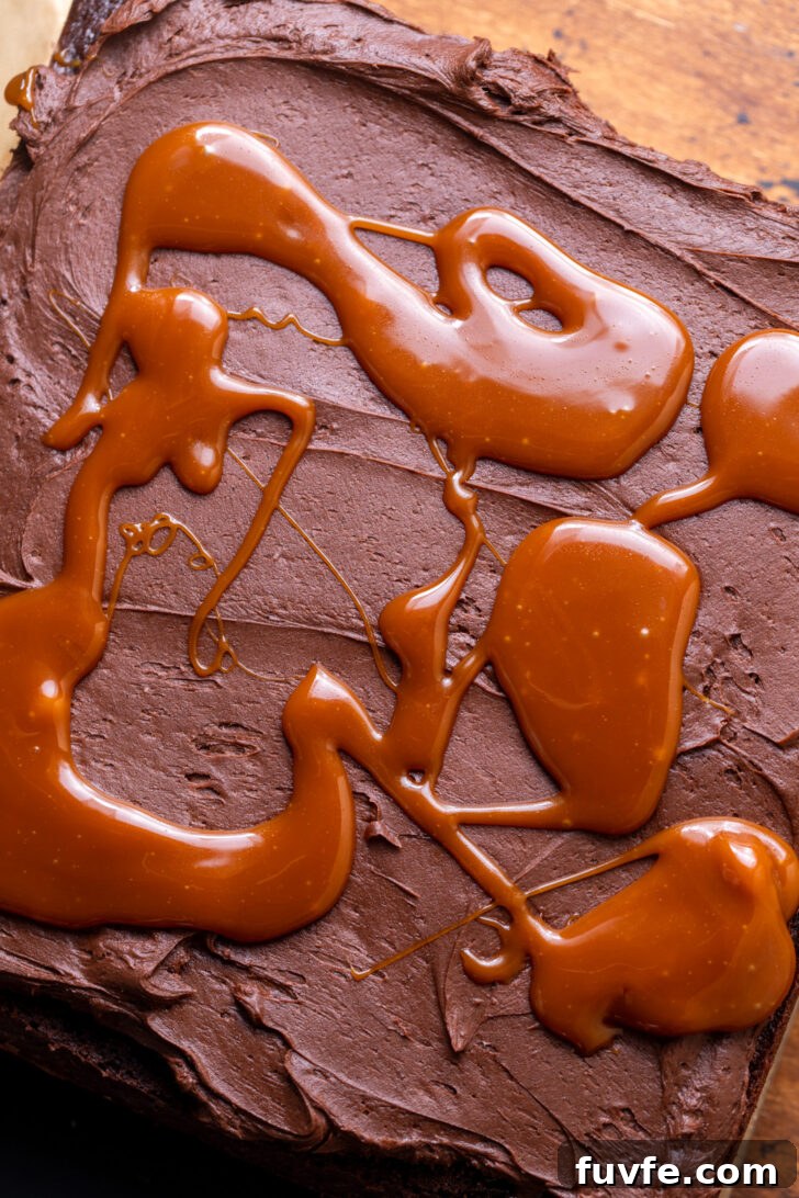 Decadent Chocolate Caramel Cake Recipe for Special Occasions 8 Caramel dollops on top of frosting.