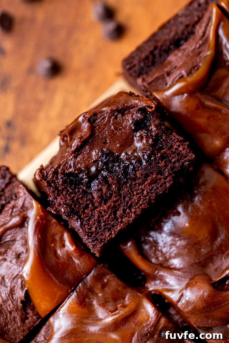 Decadent Chocolate Caramel Cake Recipe for Special Occasions 9 One cake slice on its side.