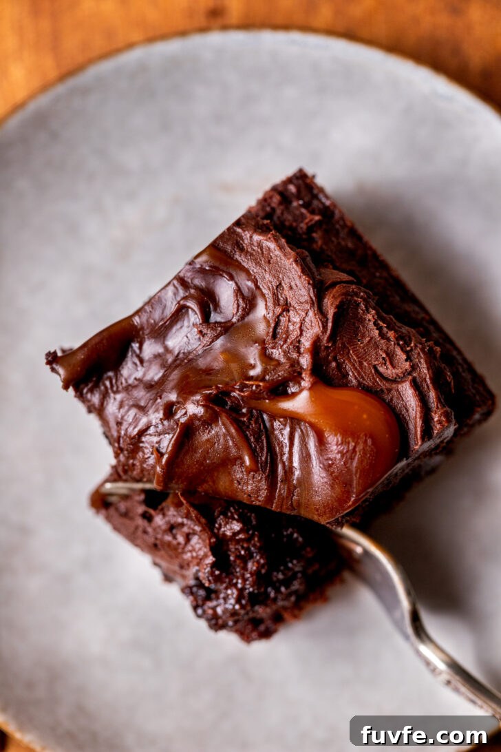 Decadent Chocolate Caramel Cake Recipe for Special Occasions 10 Top view of one cake slice on a plate.