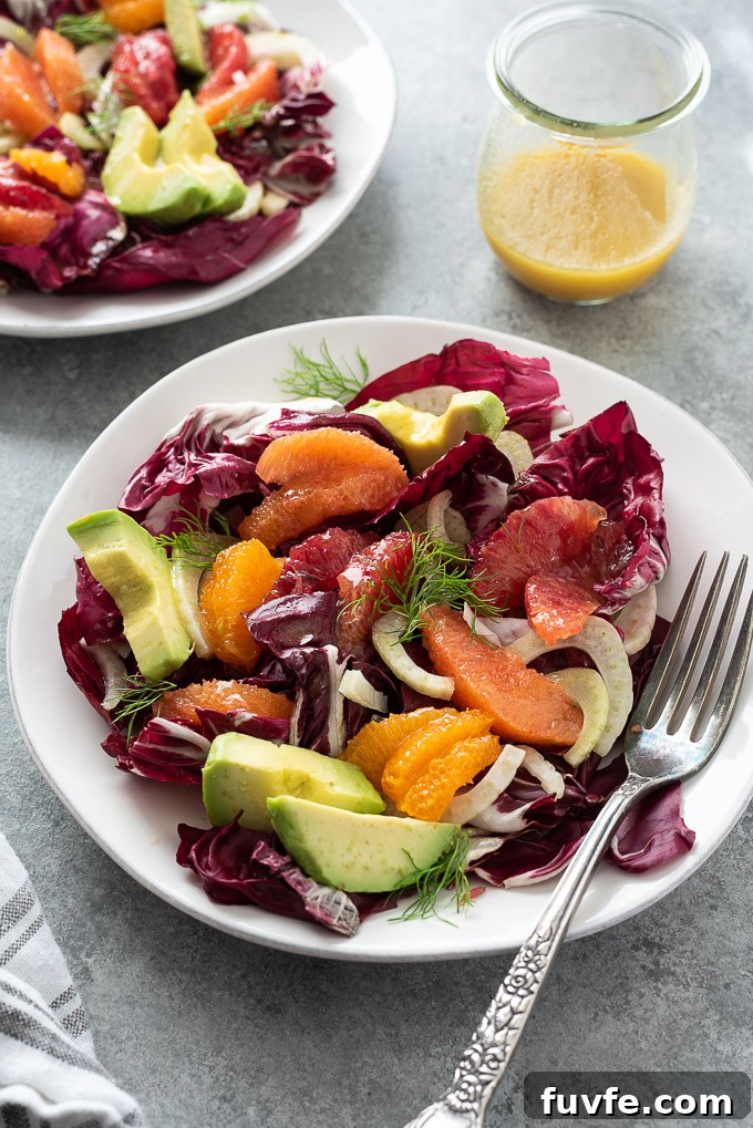 Radiccho salad on a plate with avocado and orange