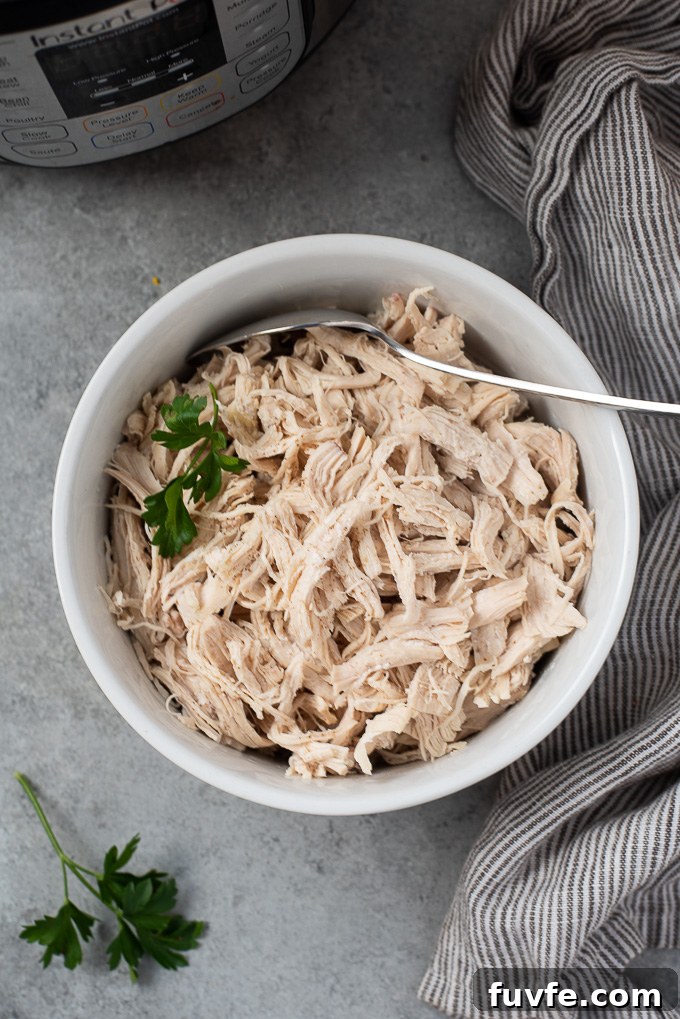 How to Make Shredded Chicken in the Instant Pot 7 Shredded chicken breast in white dish