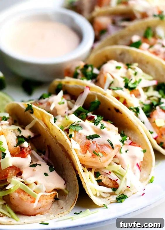 Radish Recipes: Over 20 Ideas and a Produce Guide 19 A plate of spicy shrimp tacos with a dish of sauce.