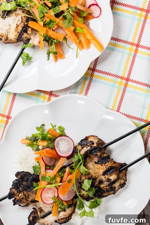 Radish Recipes: Over 20 Ideas and a Produce Guide 20 Five spice chicken skewers on a white plate.