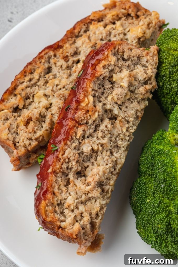 Smoky Barbecue Turkey Meatloaf with Oats 8 Slices of turkey meatloaf on a plate