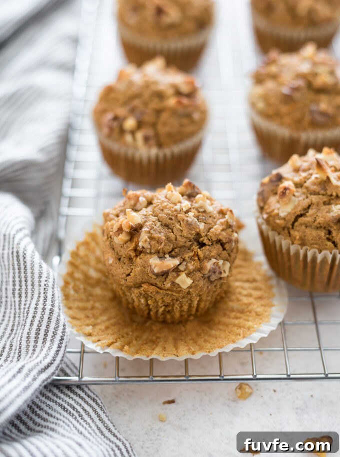 Gluten-free carrot muffins with oat flour with paper liner removed.