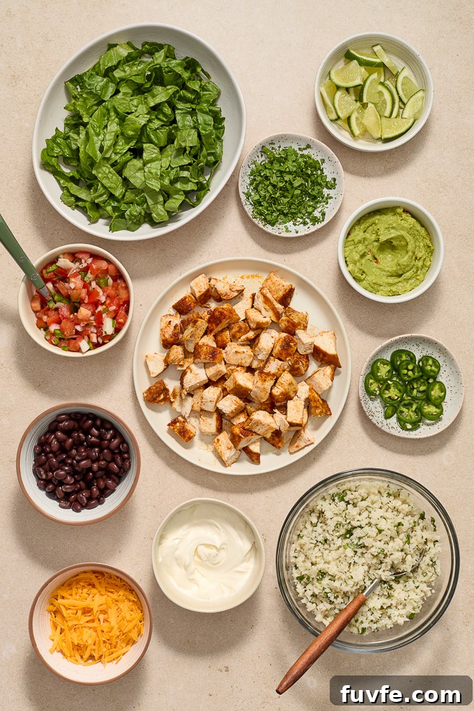 Prepped ingredients for chicken burrito bowls.