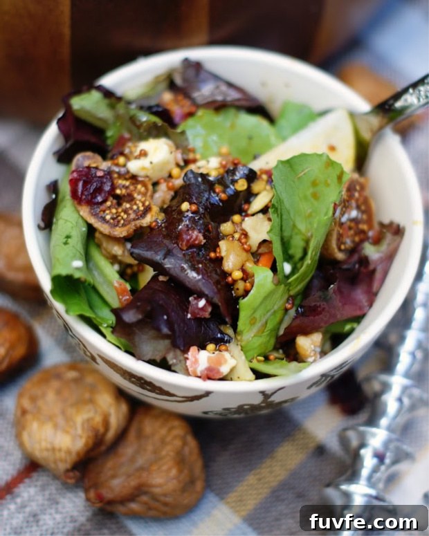 An autumn pear salad with figs dressed with a molasses vinaigrette