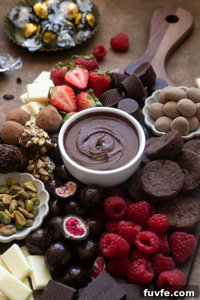 Chocolate Dessert Charcuterie Board Ideas for Parties 3 Chocolate dessert board with chocolate ganache in the middle.