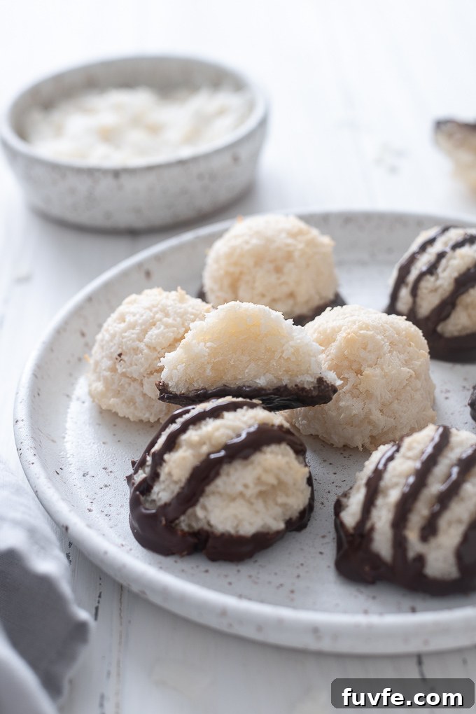 Coconut macaroon cookies piled on a plate